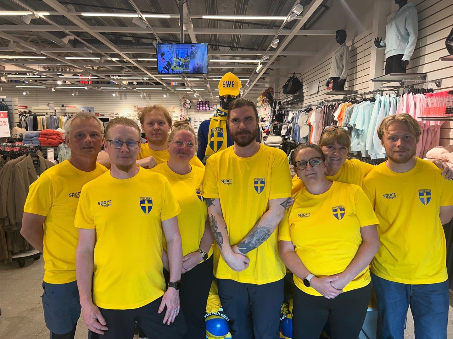Lag i matchtröjor med klubbtryck